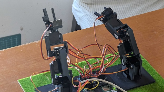 Introducing a 3D-Printed Arm Robot for Learning Quantum Computing